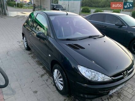 Черный Пежо 206, объемом двигателя 1.1 л и пробегом 211 тыс. км за 3100 $, фото 1 на Automoto.ua