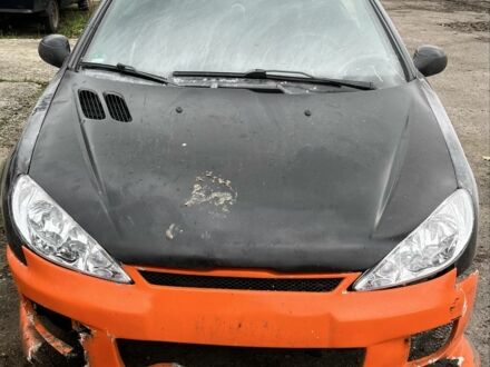 Черный Пежо 206, объемом двигателя 1.6 л и пробегом 226 тыс. км за 1200 $, фото 1 на Automoto.ua