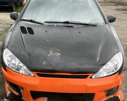 Черный Пежо 206, объемом двигателя 1.6 л и пробегом 226 тыс. км за 1200 $, фото 1 на Automoto.ua