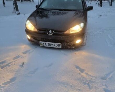 Черный Пежо 206, объемом двигателя 1.6 л и пробегом 240 тыс. км за 2950 $, фото 1 на Automoto.ua