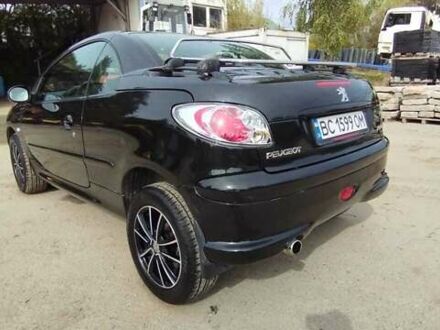 Черный Пежо 206, объемом двигателя 1.6 л и пробегом 280 тыс. км за 3500 $, фото 1 на Automoto.ua