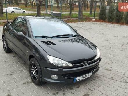 Черный Пежо 206, объемом двигателя 1.59 л и пробегом 216 тыс. км за 3800 $, фото 1 на Automoto.ua