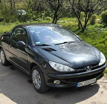 Черный Пежо 206, объемом двигателя 1.6 л и пробегом 222 тыс. км за 3800 $, фото 1 на Automoto.ua