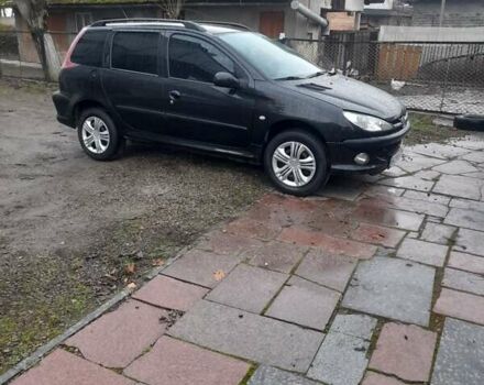 Черный Пежо 206, объемом двигателя 1.4 л и пробегом 298 тыс. км за 2896 $, фото 1 на Automoto.ua