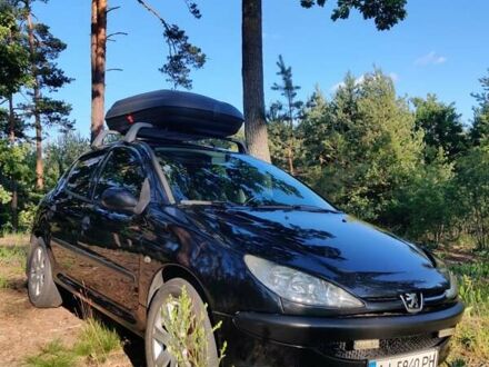 Чорний Пежо 206, об'ємом двигуна 1.36 л та пробігом 170 тис. км за 4000 $, фото 1 на Automoto.ua