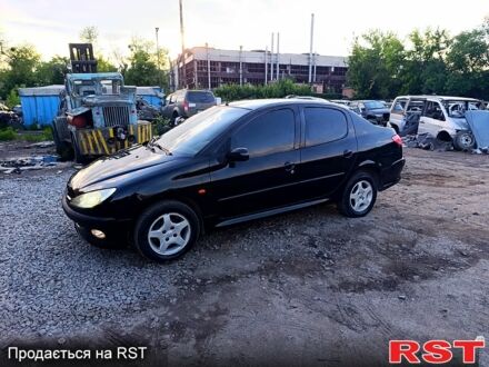 Черный Пежо 206, объемом двигателя 1.4 л и пробегом 220 тыс. км за 2499 $, фото 1 на Automoto.ua