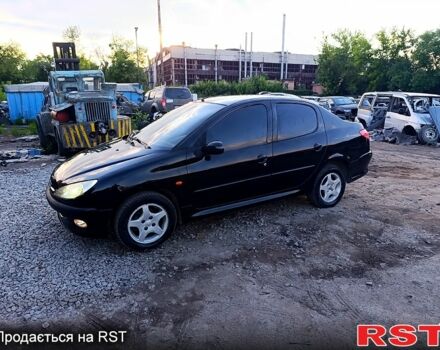 Черный Пежо 206, объемом двигателя 1.4 л и пробегом 220 тыс. км за 2499 $, фото 1 на Automoto.ua