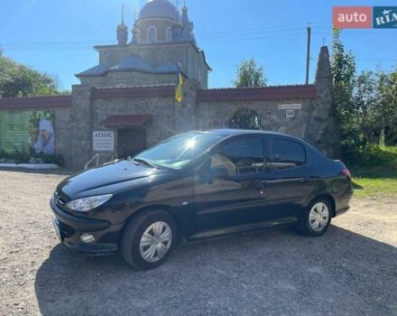 Чорний Пежо 206, об'ємом двигуна 1.36 л та пробігом 230 тис. км за 3200 $, фото 1 на Automoto.ua