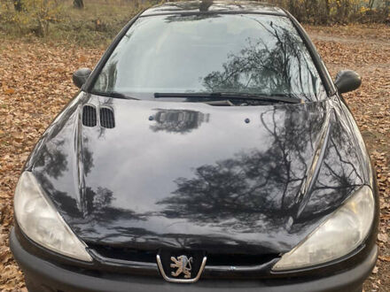 Чорний Пежо 206, об'ємом двигуна 1.4 л та пробігом 148 тис. км за 2100 $, фото 1 на Automoto.ua