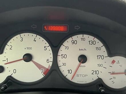 Черный Пежо 206, объемом двигателя 1.36 л и пробегом 139 тыс. км за 4300 $, фото 1 на Automoto.ua