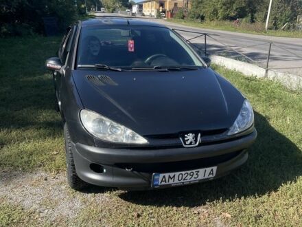 Черный Пежо 206, объемом двигателя 1.4 л и пробегом 200 тыс. км за 2300 $, фото 1 на Automoto.ua