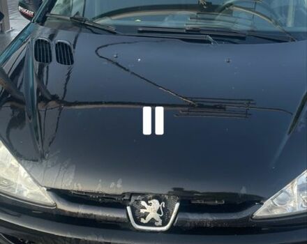 Черный Пежо 206, объемом двигателя 1.4 л и пробегом 208 тыс. км за 2300 $, фото 1 на Automoto.ua