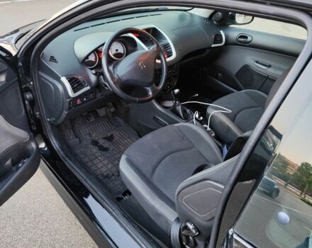 Черный Пежо 206, объемом двигателя 0 л и пробегом 183 тыс. км за 3000 $, фото 1 на Automoto.ua