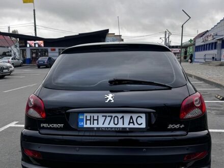 Черный Пежо 206, объемом двигателя 1.4 л и пробегом 207 тыс. км за 5900 $, фото 1 на Automoto.ua
