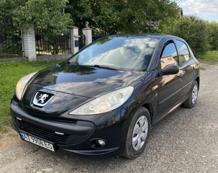 Черный Пежо 206, объемом двигателя 1.4 л и пробегом 249 тыс. км за 4100 $, фото 1 на Automoto.ua