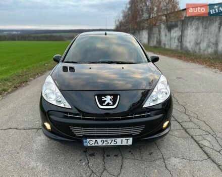 Черный Пежо 206, объемом двигателя 1.4 л и пробегом 263 тыс. км за 4300 $, фото 1 на Automoto.ua