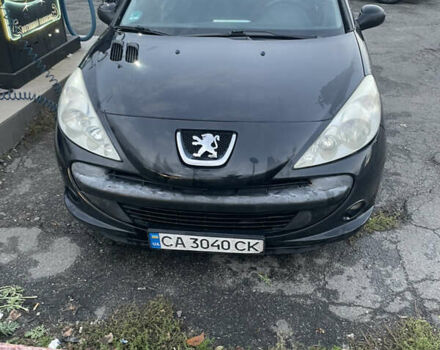 Черный Пежо 206, объемом двигателя 1.1 л и пробегом 335 тыс. км за 3200 $, фото 1 на Automoto.ua