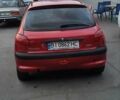 Красный Пежо 206, объемом двигателя 1.4 л и пробегом 310 тыс. км за 3200 $, фото 1 на Automoto.ua