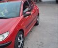 Красный Пежо 206, объемом двигателя 1.4 л и пробегом 310 тыс. км за 3200 $, фото 1 на Automoto.ua