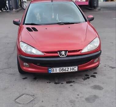 Красный Пежо 206, объемом двигателя 1.4 л и пробегом 310 тыс. км за 3200 $, фото 4 на Automoto.ua