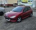 Красный Пежо 206, объемом двигателя 1.1 л и пробегом 200 тыс. км за 2100 $, фото 1 на Automoto.ua