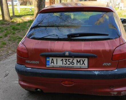 Червоний Пежо 206, об'ємом двигуна 1.4 л та пробігом 265 тис. км за 1999 $, фото 4 на Automoto.ua