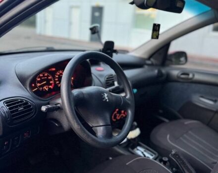 Красный Пежо 206, объемом двигателя 1.4 л и пробегом 236 тыс. км за 1900 $, фото 7 на Automoto.ua