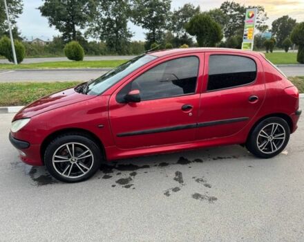 Красный Пежо 206, объемом двигателя 1.4 л и пробегом 236 тыс. км за 1900 $, фото 1 на Automoto.ua