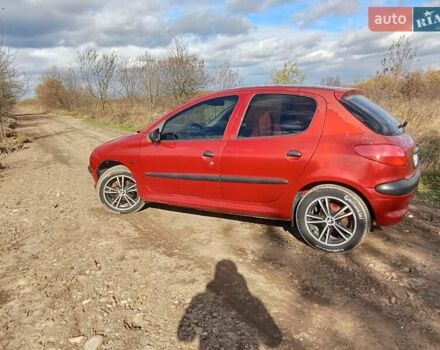 Червоний Пежо 206, об'ємом двигуна 1.4 л та пробігом 458 тис. км за 2450 $, фото 3 на Automoto.ua