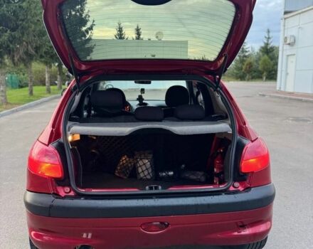 Красный Пежо 206, объемом двигателя 1.4 л и пробегом 236 тыс. км за 1900 $, фото 4 на Automoto.ua