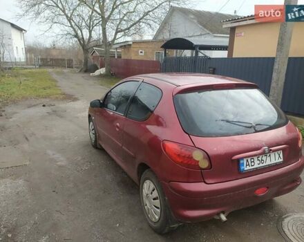 Красный Пежо 206, объемом двигателя 1.87 л и пробегом 315 тыс. км за 2700 $, фото 1 на Automoto.ua