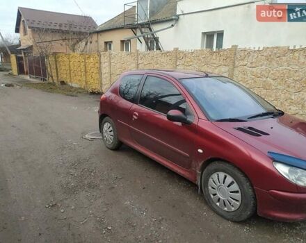 Красный Пежо 206, объемом двигателя 1.87 л и пробегом 315 тыс. км за 2700 $, фото 3 на Automoto.ua