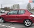 Красный Пежо 206, объемом двигателя 1.4 л и пробегом 179 тыс. км за 3600 $, фото 8 на Automoto.ua