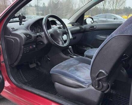 Красный Пежо 206, объемом двигателя 1.4 л и пробегом 179 тыс. км за 3600 $, фото 13 на Automoto.ua