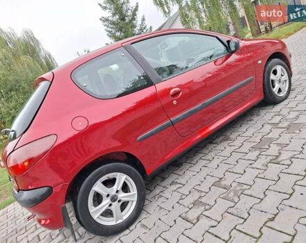 Красный Пежо 206, объемом двигателя 1.36 л и пробегом 230 тыс. км за 2200 $, фото 13 на Automoto.ua
