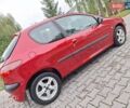 Красный Пежо 206, объемом двигателя 1.36 л и пробегом 230 тыс. км за 2200 $, фото 13 на Automoto.ua