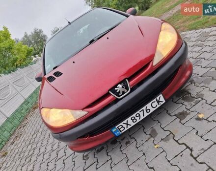 Красный Пежо 206, объемом двигателя 1.36 л и пробегом 230 тыс. км за 2200 $, фото 18 на Automoto.ua