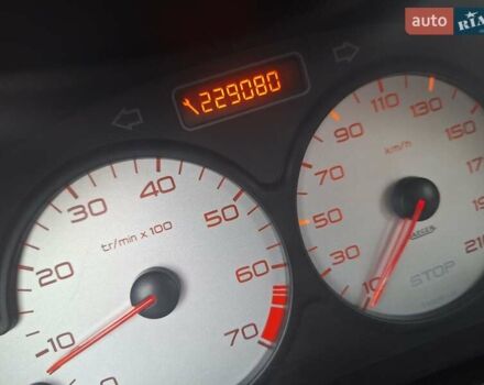 Красный Пежо 206, объемом двигателя 1.36 л и пробегом 230 тыс. км за 2200 $, фото 42 на Automoto.ua