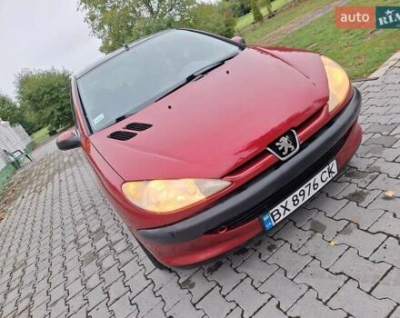Красный Пежо 206, объемом двигателя 1.36 л и пробегом 230 тыс. км за 2200 $, фото 17 на Automoto.ua
