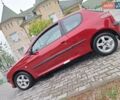Красный Пежо 206, объемом двигателя 1.36 л и пробегом 230 тыс. км за 2200 $, фото 2 на Automoto.ua