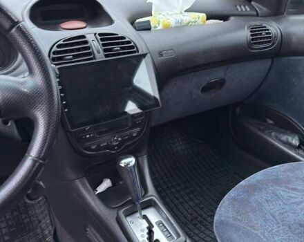 Красный Пежо 206, объемом двигателя 1.4 л и пробегом 179 тыс. км за 3600 $, фото 15 на Automoto.ua