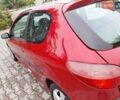Красный Пежо 206, объемом двигателя 1.36 л и пробегом 230 тыс. км за 2200 $, фото 5 на Automoto.ua