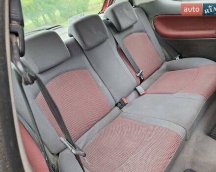 Красный Пежо 206, объемом двигателя 1.36 л и пробегом 230 тыс. км за 2200 $, фото 29 на Automoto.ua