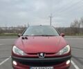 Красный Пежо 206, объемом двигателя 1.4 л и пробегом 179 тыс. км за 3600 $, фото 21 на Automoto.ua
