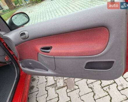 Красный Пежо 206, объемом двигателя 1.36 л и пробегом 230 тыс. км за 2200 $, фото 22 на Automoto.ua