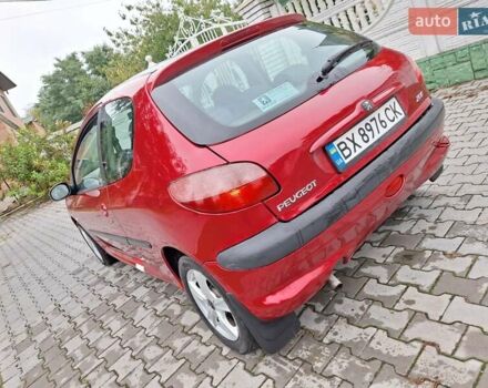 Красный Пежо 206, объемом двигателя 1.36 л и пробегом 230 тыс. км за 2200 $, фото 9 на Automoto.ua