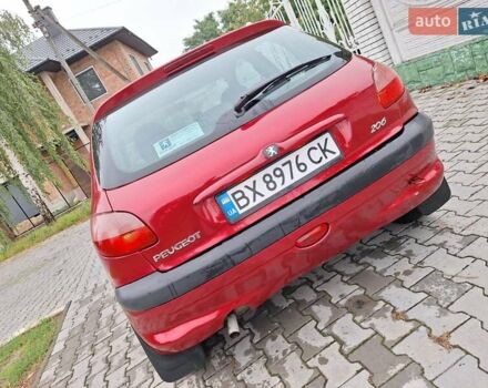 Красный Пежо 206, объемом двигателя 1.36 л и пробегом 230 тыс. км за 2200 $, фото 6 на Automoto.ua