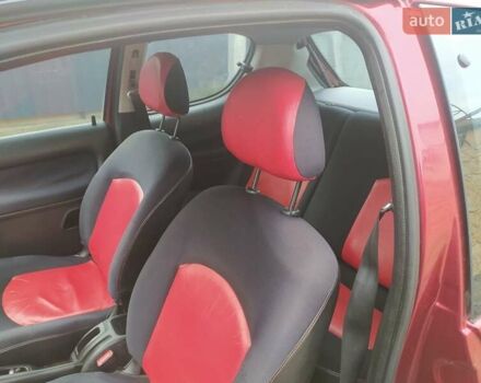 Красный Пежо 206, объемом двигателя 1.87 л и пробегом 315 тыс. км за 2700 $, фото 5 на Automoto.ua