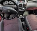 Красный Пежо 206, объемом двигателя 1.3 л и пробегом 228 тыс. км за 2300 $, фото 8 на Automoto.ua