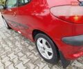 Красный Пежо 206, объемом двигателя 1.36 л и пробегом 230 тыс. км за 2200 $, фото 4 на Automoto.ua